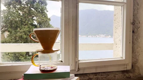 Pour Over Coffee Brewing by Rainy Window | Cozy Rainy Day Coffee Ritual Stock Footage 335880369