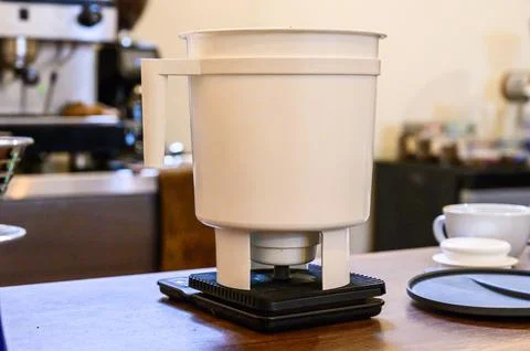 Pour over coffee brewing using a drip brewer device Stock Photos