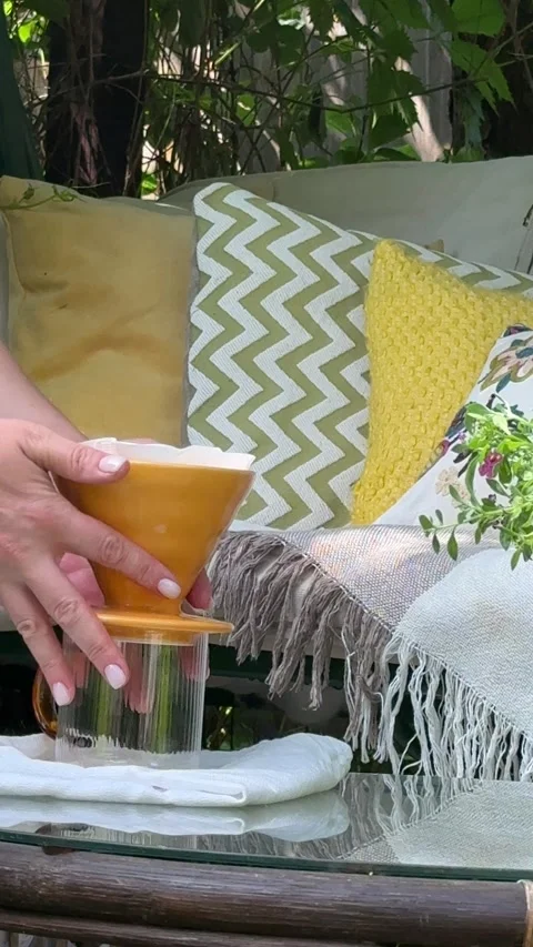 Pour Over Coffee Preparation in Cozy Garden Lounge Stock-Footage 337192382