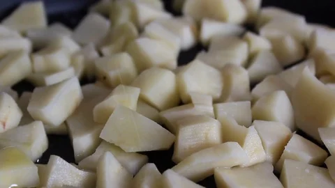 Pour potatoes oil Stock Footage 77693104