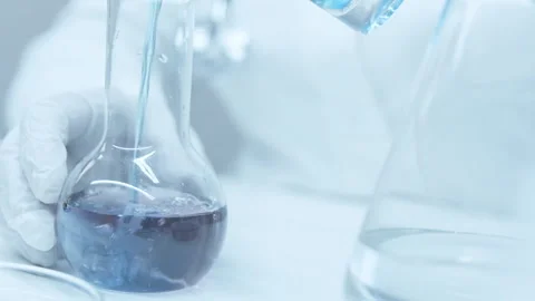 Pour reagent into test tubes. Stock Footage 248307156