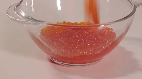 Pour red caviar Video stock 68710544