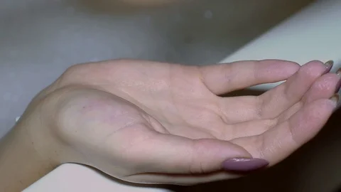 Pour shampoo on hands Stock Footage 83630256