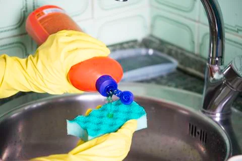 Pour soap on a sponge Stock Photos