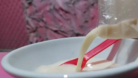 Pour in the soybean milk Stock-Footage 265721674