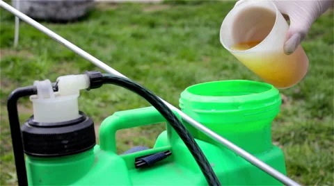 Pour into sprayer herbicides Stock Footage 49446129