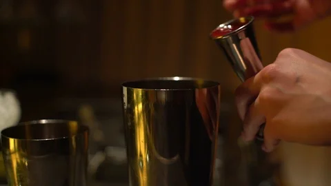Pour syrup into a Shaker Stock Footage 104680474