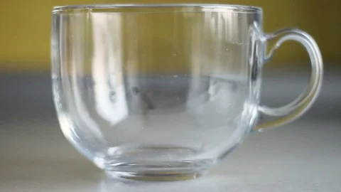 Pour the tea into the Cup Stock Footage 73791369