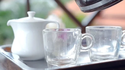 Pour in a transparent cup of delicious, invigorating coffee. HD, 1920x1080, slow Stock Footage 90842234