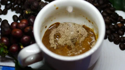 Pour water into coffee Stock Footage 104096157