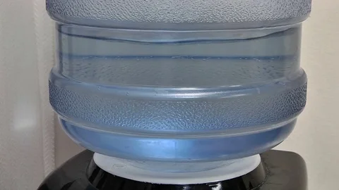 Pour water from the cooler Stock-Footage 72842717