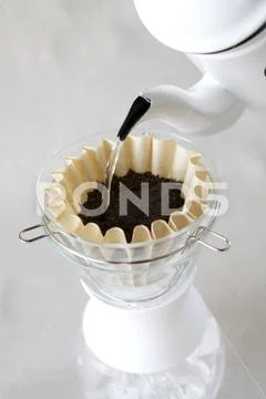 Pour water into the dripper Stock Photos