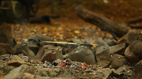 Pour water on the fire Stock Footage 24612657