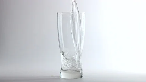 Pour water into the glass Stock Footage 104205324