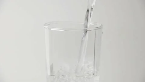 Pour water into a glass. Stock Footage 198297583