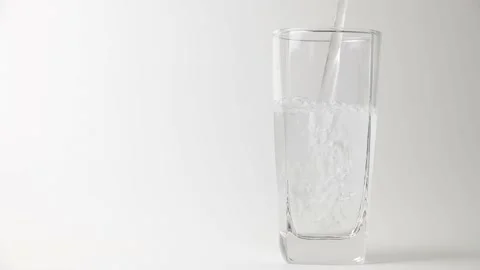 Pour water into a glass. Stock Footage 198297593