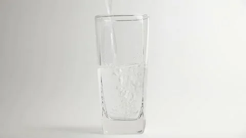 Pour water into a glass. Stock Footage 198297594