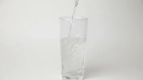Pour water into a glass. Stock Footage 198297596