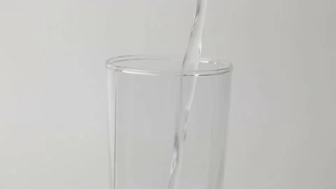Pour water into a glass. Stock Footage 198297618