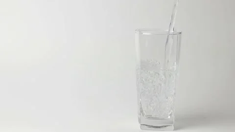 Pour water into a glass. Stock-Footage 198297627