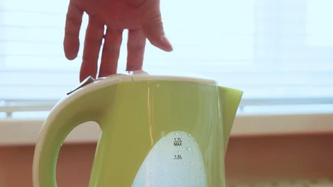 Pour water into the kettle. Stock Footage 127170201