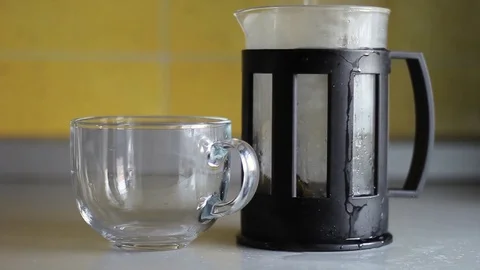 Pour water into a teapot with tea Stock Footage 73791409