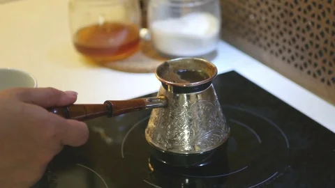 Pour in a white cup of coffee cooked in a bowl. 4k, 3840x2160. HD Stock Footage 75036352