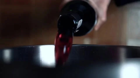 Pour wine into the pot, bottle Stock Footage