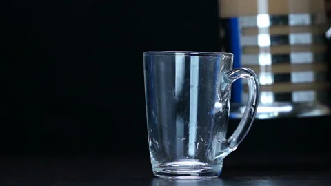 Poured into a cup indian masala tea Stock Footage 120579320