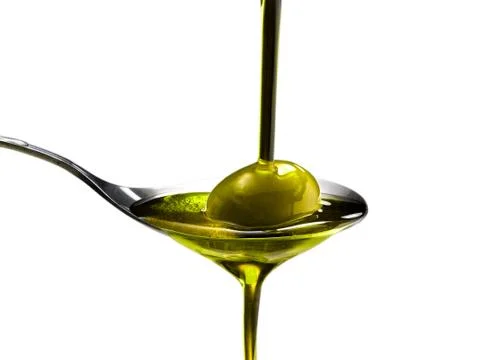 Poured extra virgin olive oil Stock Photos