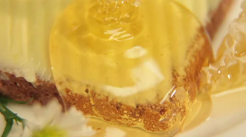Poured honey on bread with butter Video stock 41813634