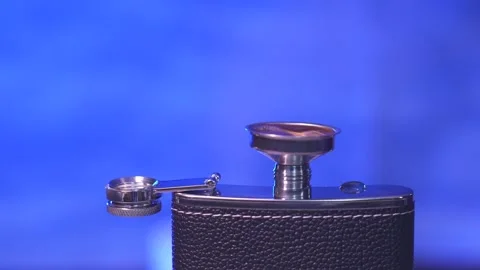 Pouring alcohol and pouring drops Stock Footage 312604351