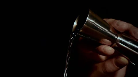 Pouring alcohol in slow motion Stock Footage 67866959