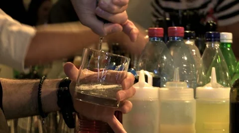Pouring an alcoholic drink Stock Footage 8570776