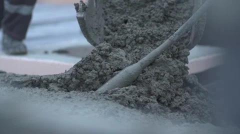 Pouring and Mixing Wet Concrete Stock Footage