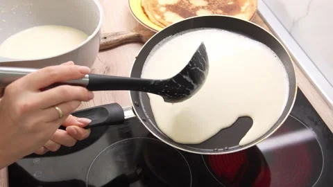 Pouring Batter onto Pan. Stock Footage 254525844