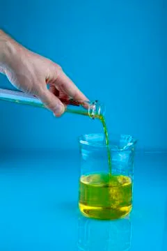 Pouring into a beaker Stock-Fotos
