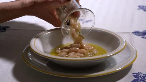 Pouring beans Stock Footage 100043053