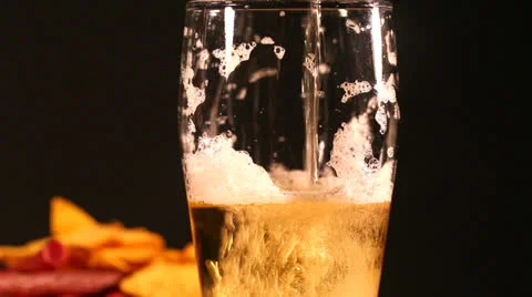 Pouring beer and bubbles Stock Footage 23542397