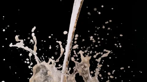 Pouring beer and making splash. Slow Motion. Stock Footage 72857471