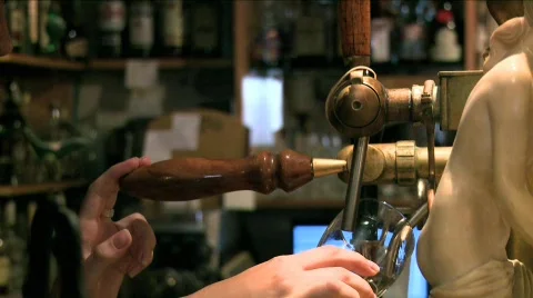Pouring beer and serving Stock Footage 607943