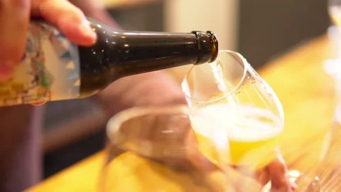 Pouring beer on bar counter Stock Footage 269062953