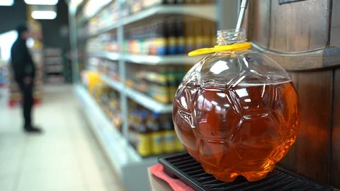 Pouring beer in a beer store. Close-up Stock Footage 129540072