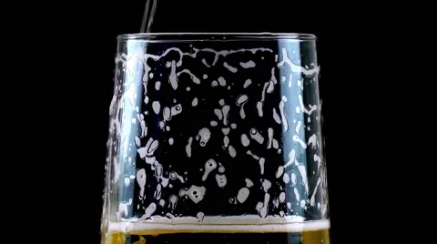 Pouring Beer on Black Background   Stock Footage 68033734
