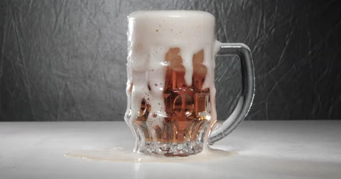 Pouring beer with bubbles and foam in glass Stock Footage 140214946