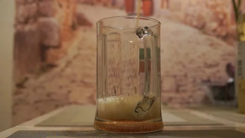 Pouring beer. Cold light beer. Craft beer. A pint of light beer Stock Footage 96195911