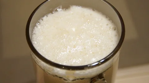Pouring beer. Cold light beer. Craft beer. A pint of light beer Stock Footage 96195923