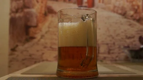 Pouring beer. Cold light beer. Craft beer. A pint of light beer Stock Footage 96196042