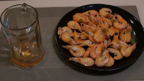 Pouring beer. Cold light beer. Craft beer. Shrimp Stock Footage 96200249