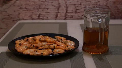 Pouring beer. Cold light beer. Craft beer. Shrimp Stock Footage 96200319